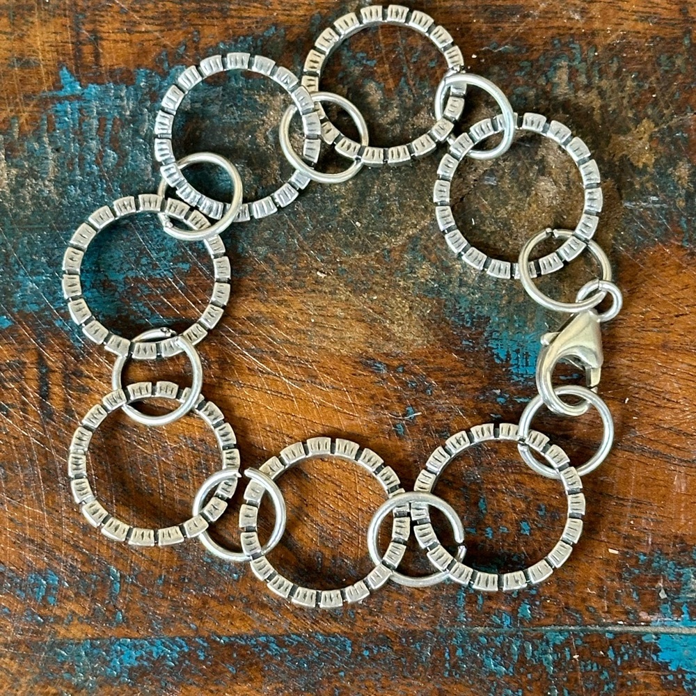 Sterling silver “Rings of Prosperity” bracelet. New in box from Sundance.